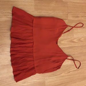 Red flowy top